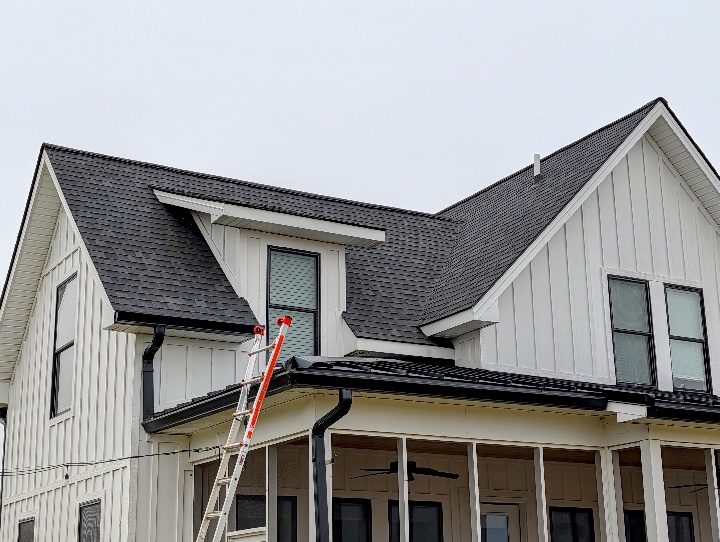 Newer Winchester-area home with a complex roof and dormers